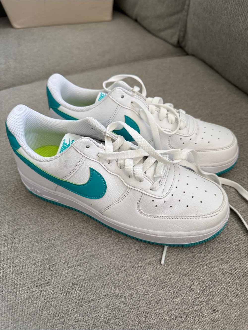 Nike White Sneakers with Teal Swoosh and Teal Accents